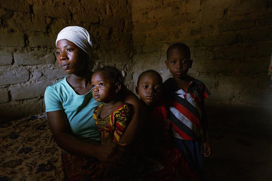 Candé’s wife, Hava, and their children at their home in Guinea-Bissau